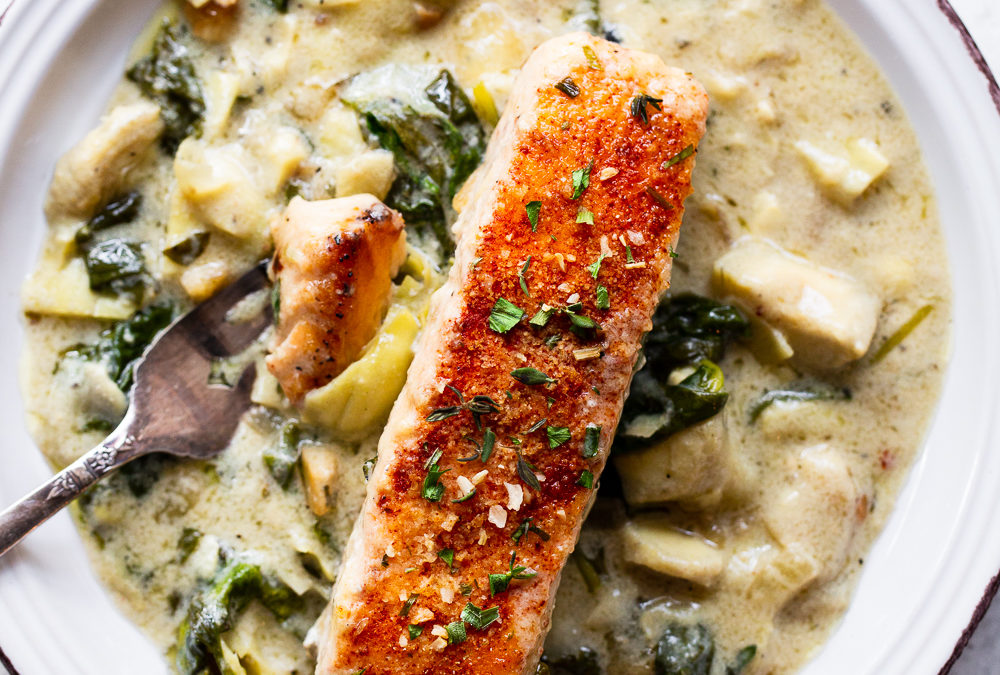 One-Skillet Salmon with Creamy Spinach Artichoke Sauce